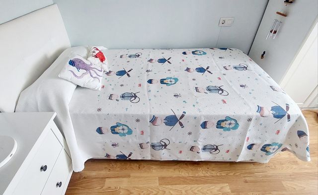 Colcha infantil con dibujos marinos