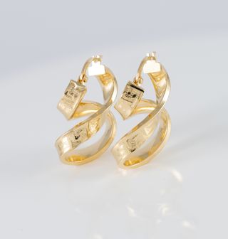 Pendientes de aro en oro 18k 750 forma de 8
