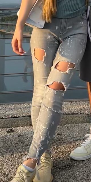 Vaqueros de lujo desgastados