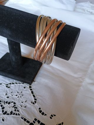 Braccialetti rigidi color oro e argento