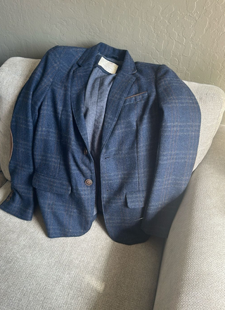 Chaqueta de traje azul y marrón