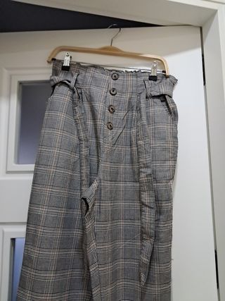 Pantalónes de cuadros gris y marron mujer