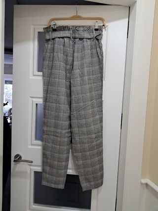 Pantalónes de cuadros gris y marron mujer