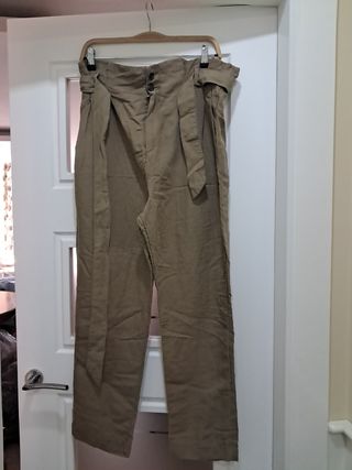 Pantalónes de cuadros gris y marron mujer