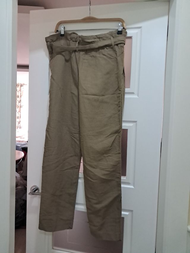 Pantalónes de cuadros gris y marron mujer