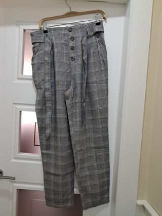 Pantalónes de cuadros gris y marron mujer