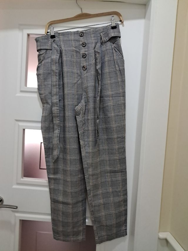 Pantalónes de cuadros gris y marron mujer