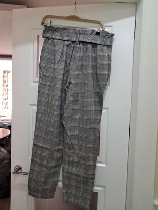 Pantalónes de cuadros gris y marron mujer
