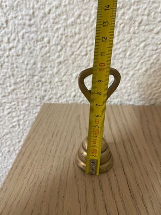 Campanilla de latón con abridor