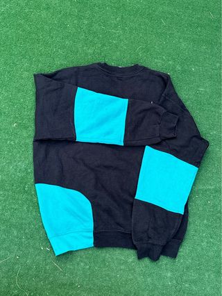 Sudadera The North Face Negra y Turquesa