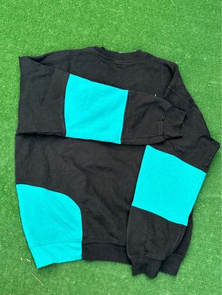 Sudadera The North Face Negra y Turquesa