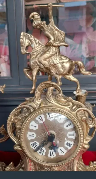 Reloj bronce.