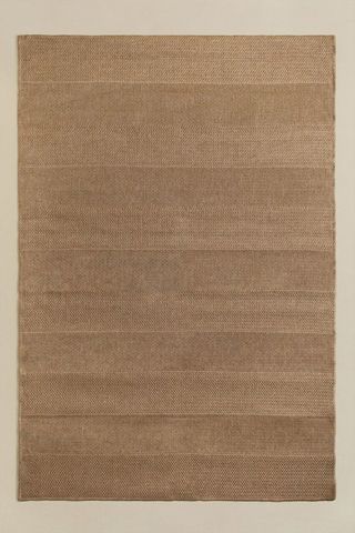 Alfombra de yute beige