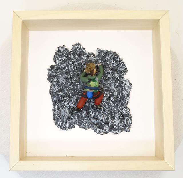 Figura escalador en roca personalizada enmarcado