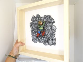 Figura escalador en roca personalizada enmarcado