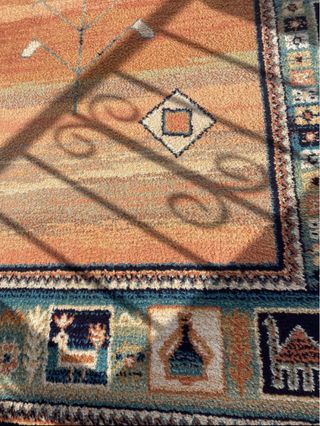 Alfombra de diseño étnico multicolor