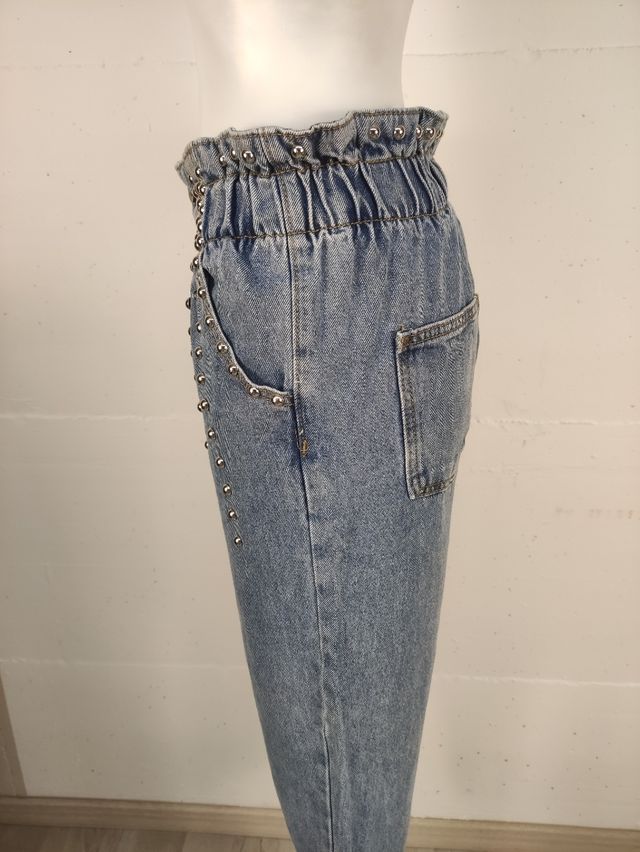 Jeans donna vita volant con borchie