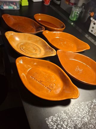 Vasijas de barro naranjas
6 piezas