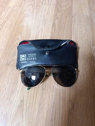 Gafas de sol aviador doradas y verdes
