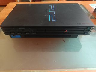 PlayStation 2 con 6 juegos y mando