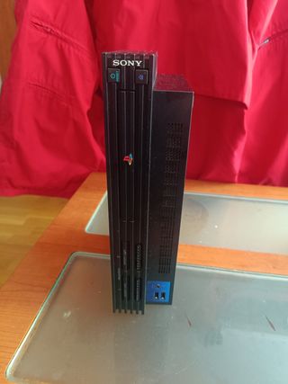 PlayStation 2 con 6 juegos y mando