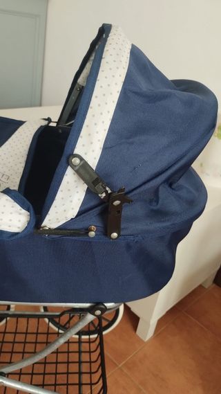 Cochecito de muñecas azul