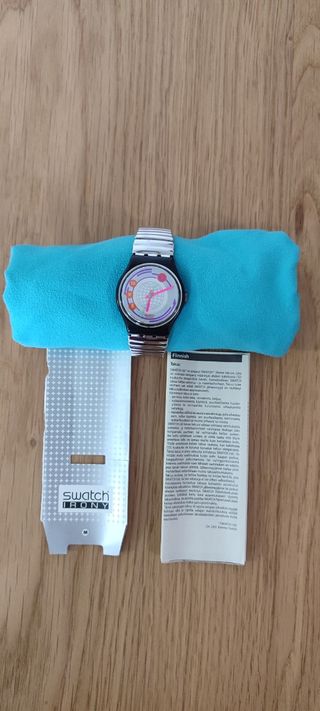 Orologio Swatch Irony con quadrante mondiale argentato