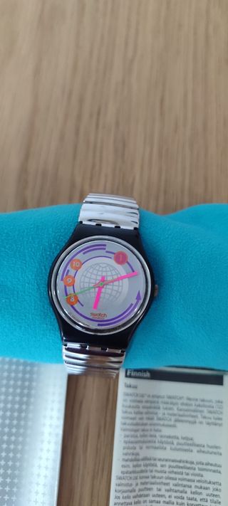 Orologio Swatch Irony con quadrante mondiale argentato