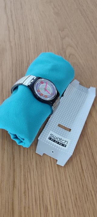 Orologio Swatch Irony con quadrante mondiale argentato