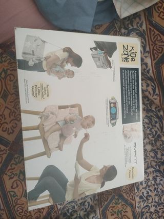 Asiento elevador convertible en bolso Jané