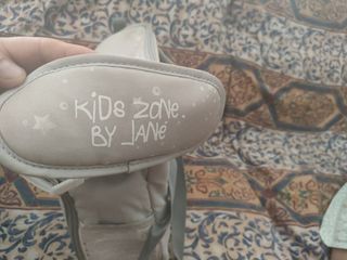 Asiento elevador convertible en bolso Jané