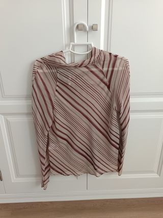 Blusa transparente con rayas