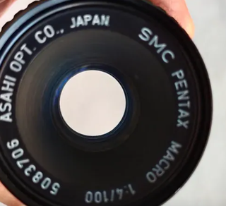 Objetivo Pentax SMC 100mm f4 Macro . (Cambio ).