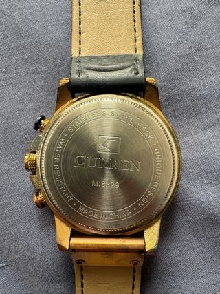 RELOJ CURREN AZUL Y DORADO CUERO NUEVO