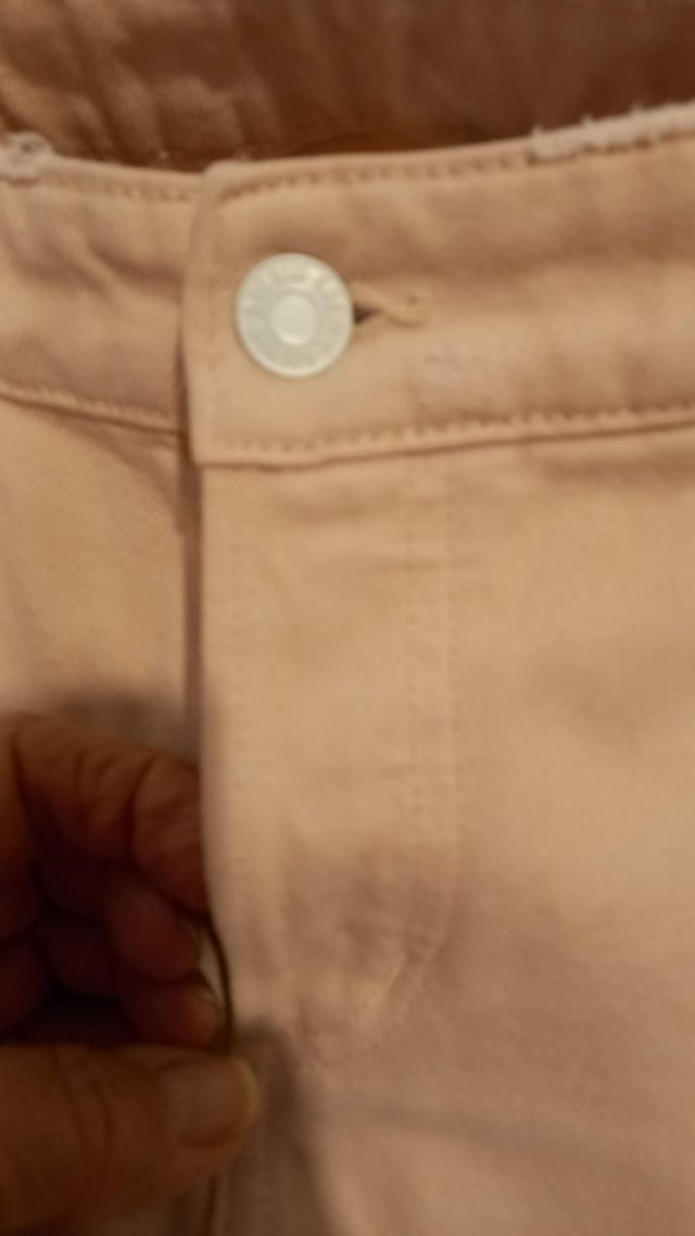 Vaquero rosa desgastados