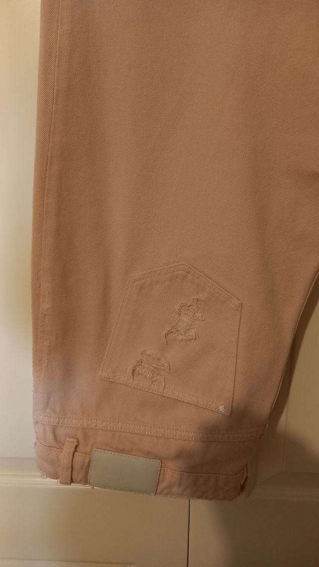 Vaquero rosa desgastados