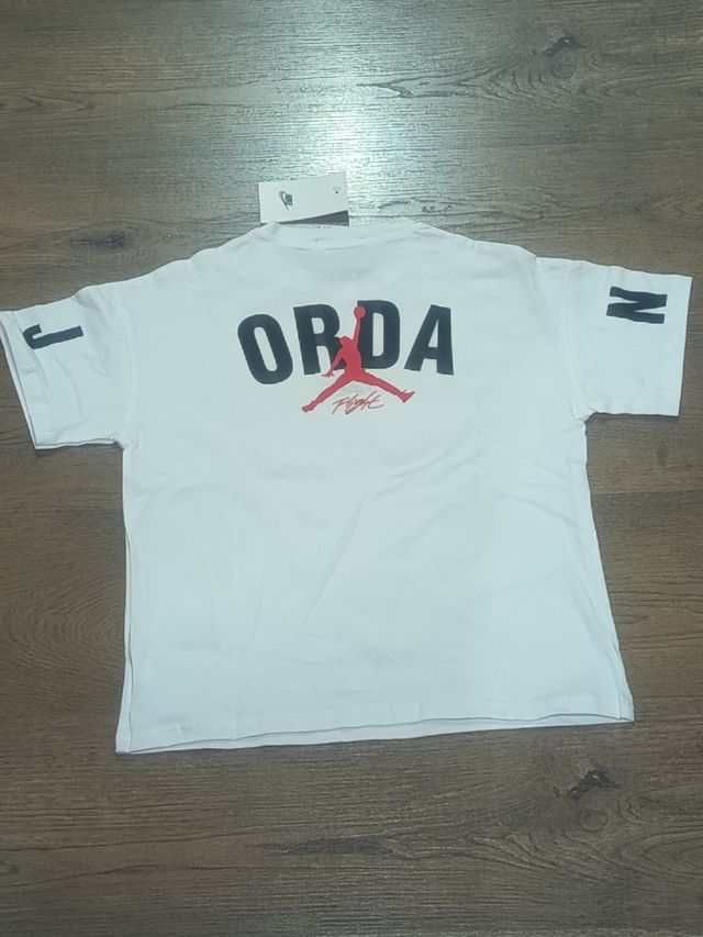 Conjunto Jordan niño blanco y naranja