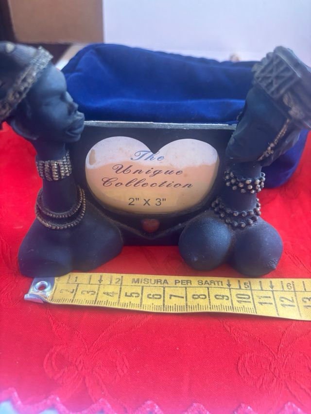 Portafoto e scultura in legno porta sale e pepe