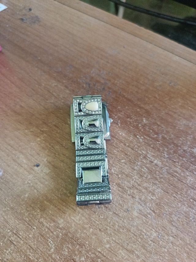 Reloj vintage beige y plateado