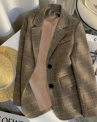 Chaqueta de cuadros beige y marrón