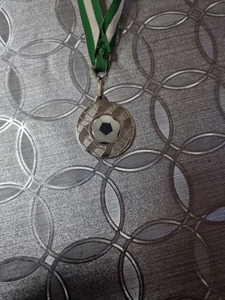 Medalla de fútbol con cinta