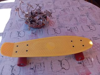 Monopatín amarillo Decathlon