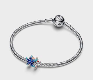 Charm en plata de ley mini estrella de mar de colo