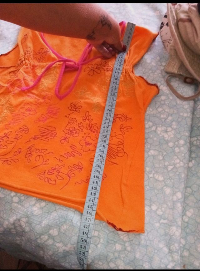 T-shirt giromanica arancione taglia S