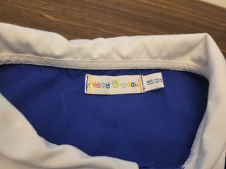 Grembiule bambino blu con colletto bianco