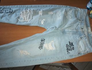 Jeans Terra strappati con scritte