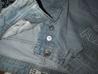 Jeans Terra strappati con scritte