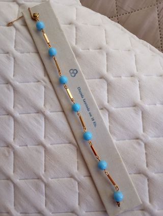 Pulsera laminada oro 18k con cuentas azules