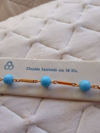 Pulsera laminada oro 18k con cuentas azules