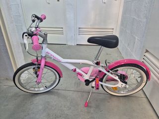 Bicicleta infantil rosa y blanca